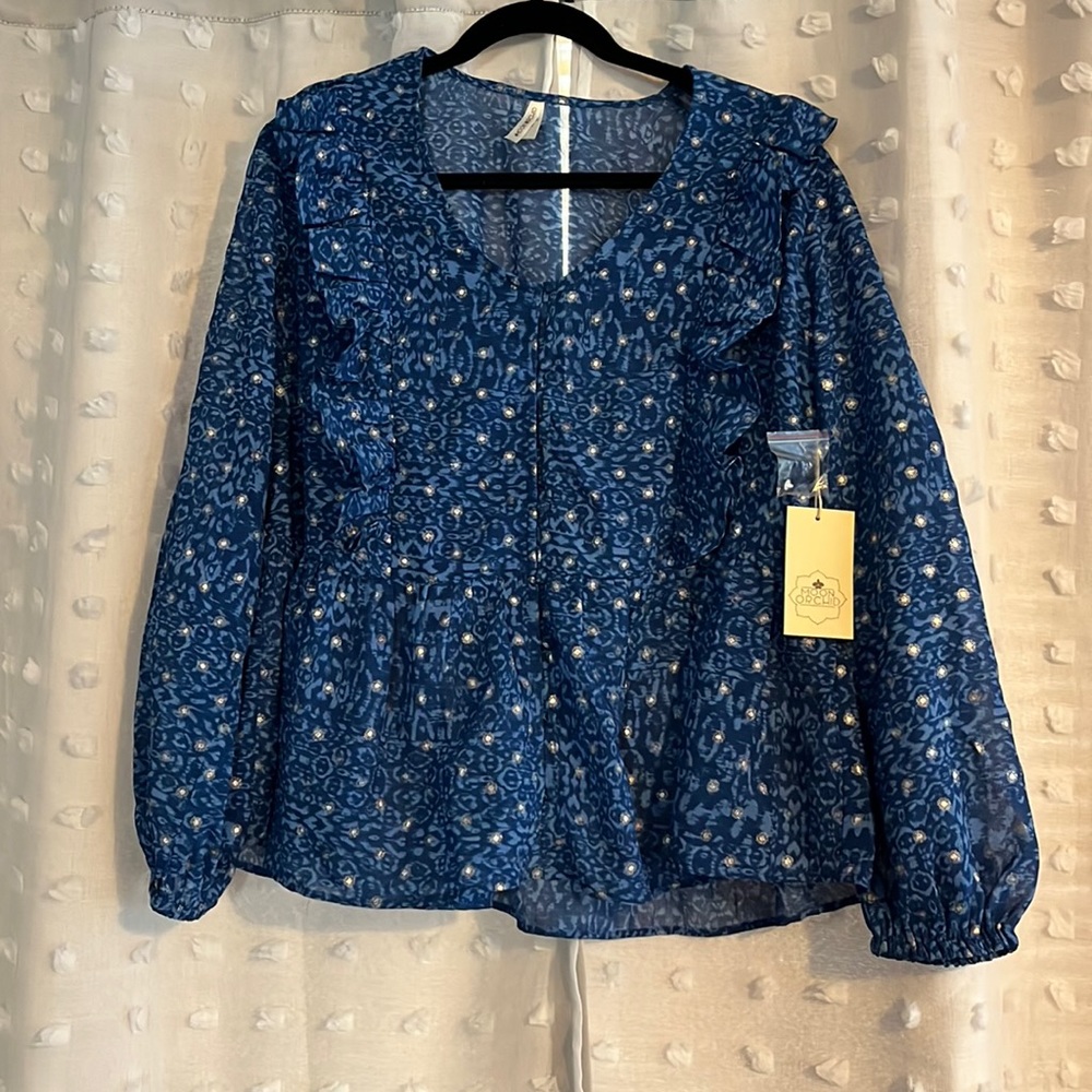 ModCloth long sleeve ruffled button up peplum top. New with tags. Never worn.